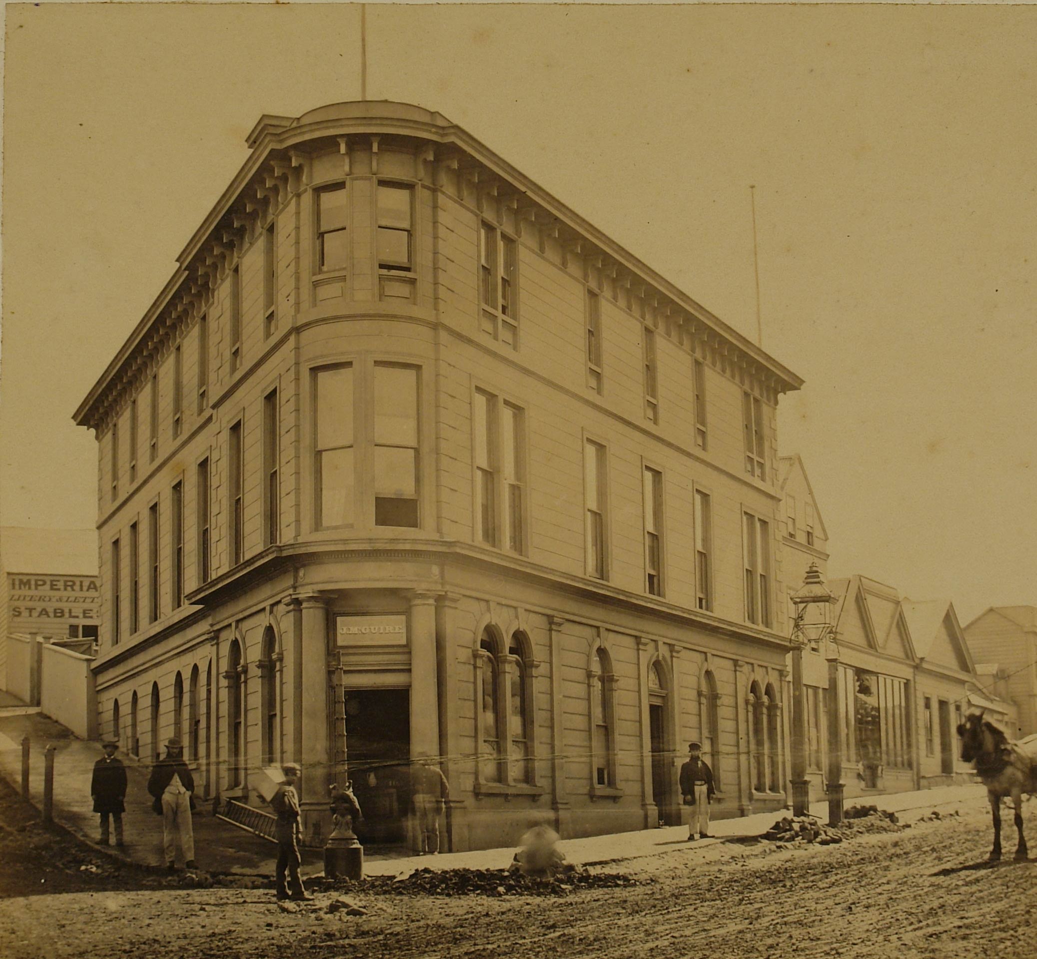 Installation of one of Millar’s gas lamps outside McGuire’s Imperial Hotel on the corner of Princes Street and Hope Street.